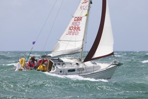 A typical reefed sail plan on a cruising yacht – the leech pennant needs to be tighter and the headsail car is too far aft – but it’s better than many. Credit: SailingScenes.com
