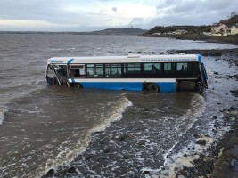Bus crashes on beach in County Down. Credit MCA