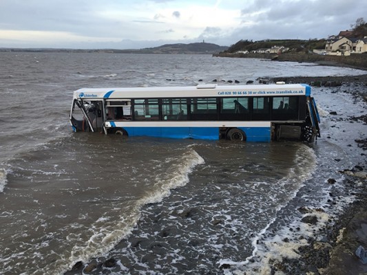 Bus crashes on beach in County Down. Credit MCA