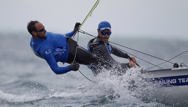 Elliot Willis (left) with Luke Patience, competing in the Men's Two Person 470 Dinghy at the ISAF Sailing World Cup Weymouth & Portland. Credit onEdition
