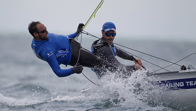 Elliot Willis (left) with Luke Patience, competing in the Men's Two Person 470 Dinghy at the ISAF Sailing World Cup Weymouth & Portland. Credit onEdition