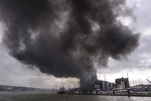 Fire at a car workshop near the Medina Boat Yard, Cowes, Isle of Wight. Credit: Rick Tomlinson