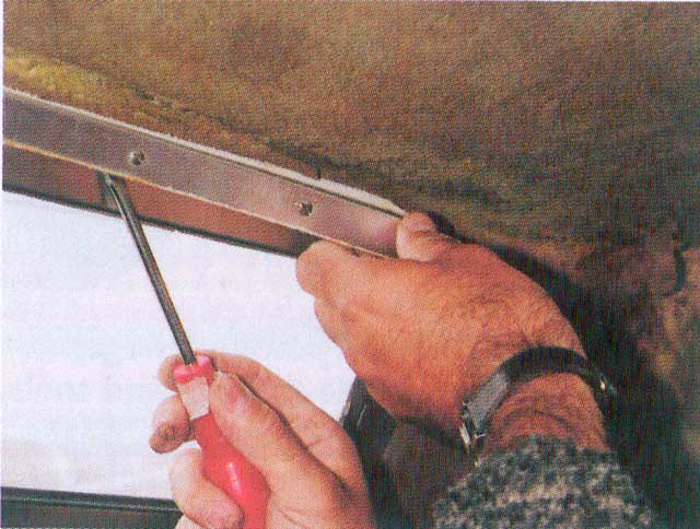 11: If the window frame is a bit stubborn, it can be prized off with a screwdriver, but be careful not to kink the metal.