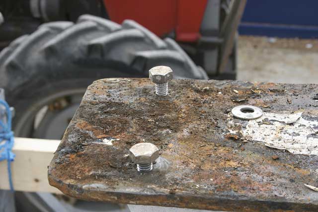 2: See the difference in the thickness of the hull from the two bolts (both flush with the bottom of the flange). The hull will certainly need thickening