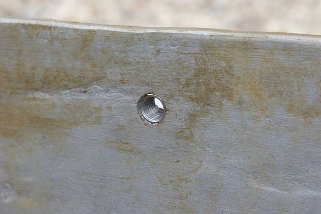 4: It’s not all bad news! All the bolt-hole threads are intact except for one. The keel is sent to a specialist for the thread to be replaced (helicoiled) and for a new hole to be drilled close to the broken corner