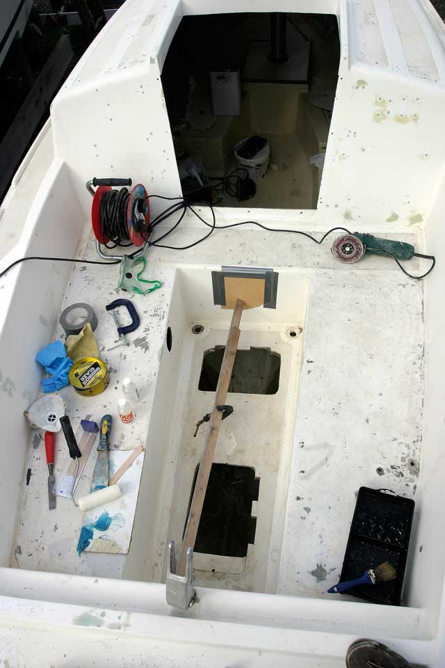 8: Push the blanking plate up against the hole and secure it. In this case we used duct-tape, and held it firmly in place with a compression post.
