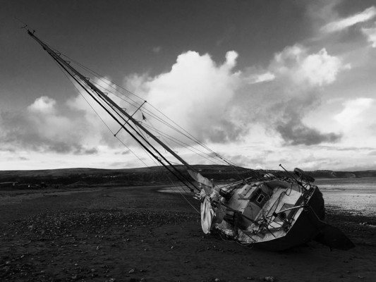 Yacht aground. Credit: The Mumbles Lifeboat RNLI
