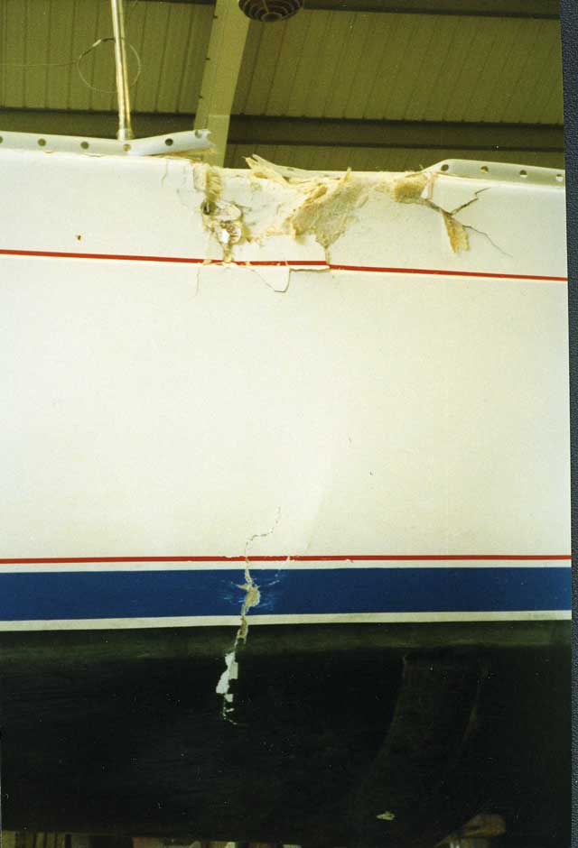 1 When this Jeanneau was struck by another yacht during a race, the damage seemed relatively light. However, once craned ashore, it was found that the hull had stress cracks from the toerail right down to below the waterline. Inside, the main saloon bulkhead had been shattered. 