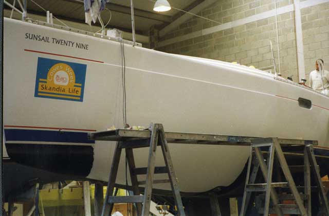 4: Colour-matched white gel coat, built up behind with chopped strand mat, has been used on the repair. Once the mould has been removed, additional layers of colour-matched gel coat will be applied from the outside. These will be repeatedly applied and sanded back until the whole hull is fair.