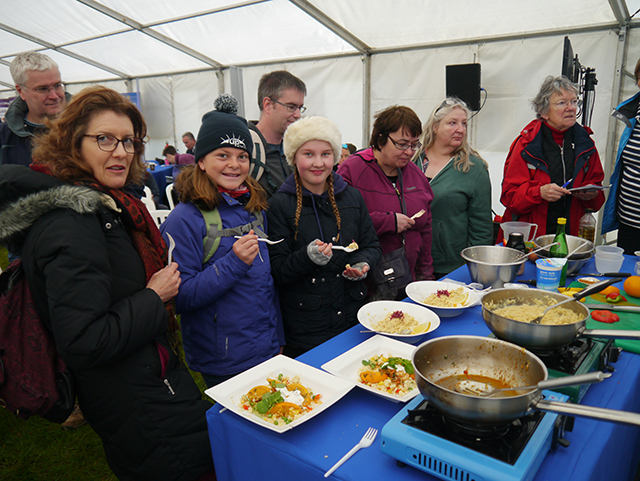 Visitors enjoy sampling dishes by David Wells from South Devon College's demonstration at PBO Ask the Experts Live at Beaulieu Boatjumble 2016