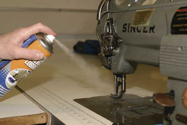 3: Before starting to sew, Alan gives the foot and needle assembly a quick spray of silicon lubricant. He’ll top this up every 15 minutes or so during the job to prevent anything from sticking.