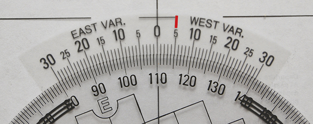 Set the compass rose to 115°– we’re lining it up with the 5° west variation