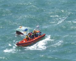 The mast and bow of Alchemist can be seen seconds before she sank. Credit: RNLI/Marion Heming