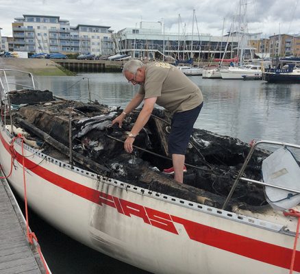 Saying farewell - Robert Thornewill aboard the charred remains of Eleanor C