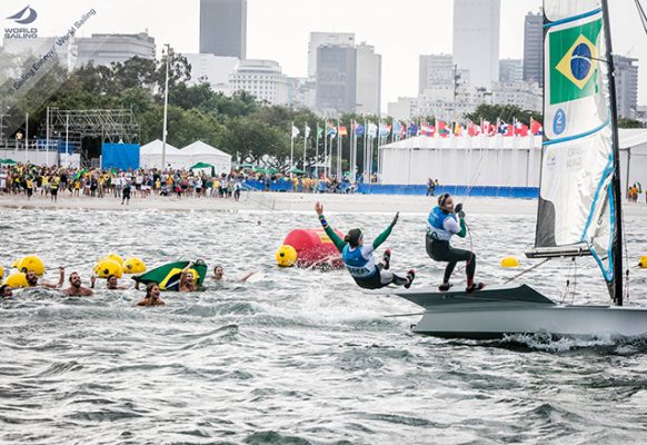 Brazil's Martine Grael and Kahena Kunze celebrate after winning 49erFX gold at the Rio 2016 Olympic sailing regatta. ©Sailing Energy / World Sailing