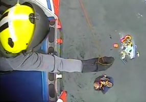 Coastguard helicopter rescues five men from sinking boat
