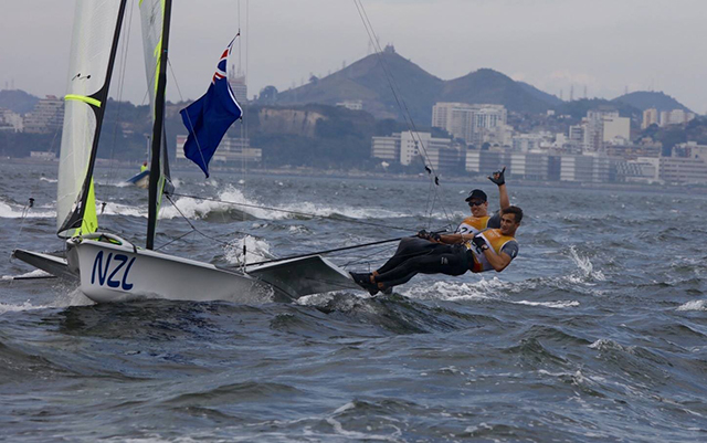 New Zealand sailors Peter Burling and Blair Tuke celebrate after securing the 49er Men's gold medal with two races to spare. ©Jesus Renedo
