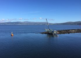 Yacht aground at entrance to James Watt Dock Marina. Credit: Kevin Smyth