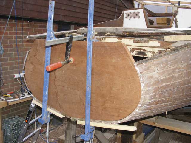 The new mahogany transom was fixed in place