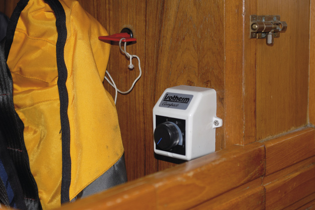 The thermostat/switch in position inside the hanging locker behind the navigator’s seat