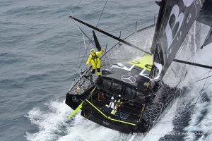 Aerial shot of Vendee Globe yacht Hugo Boss, skippered by Alex Thomson, off the Kerguelen Islands. Credit: Marine Nationale/Nefertiti/Vendee Globe