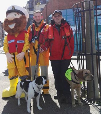 The RNLI’s Stormy Stan pictured with sailor Chris Egan and Brian Curtin, RNLI Community Fundraising Manager and Valentia RNLI crew member. Credit: RNLI/Len Lloyd