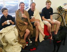The rescued family (L-R Theo, Tania, Joe, and Hector Coles with dog Suki). Credit: Jade Dyer/RNLI/Lyme Regis