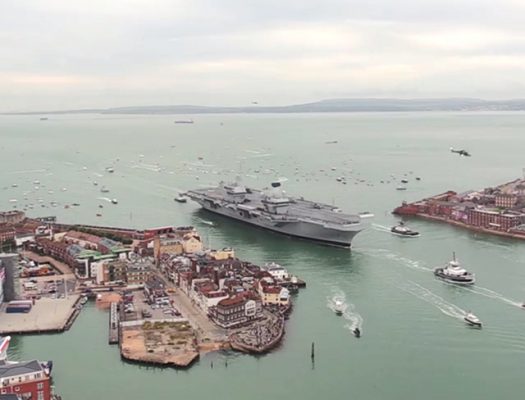 HMS Queen Elizabeth entering Portsmouth Harbour. Credit: Royal Navy