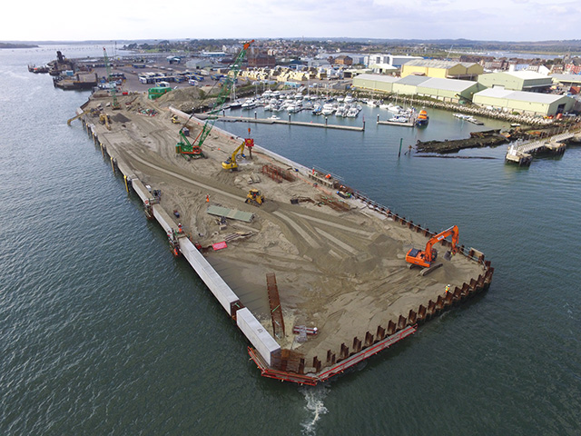 Diggers work on the extension to South Quay in Poole