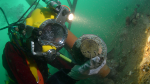 An underwater archaeologist working on the projtect wreck, Rooswijk which is deemed heritage at risk