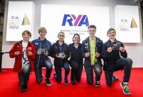 Young sailors and boaters with their RYA awards