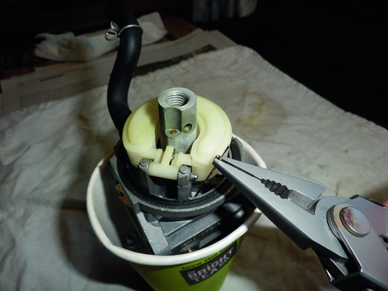 How to clean an outboard motor carburettor stepbystep Practical Boat Owner