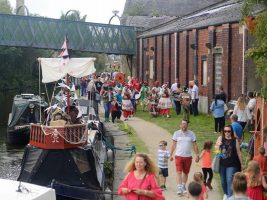 People walking the towpath of the Burnley Canal