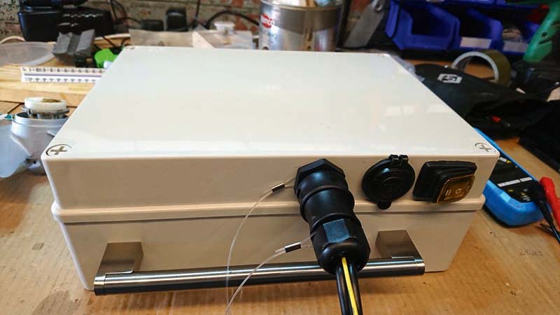 DIY-electric-outboard-motor-Battery box showing main power outlet. Note stainless steel carry handle from a kitchen unit