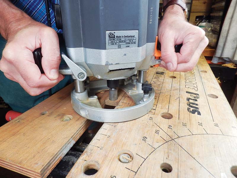 13 - Securely held plunge router