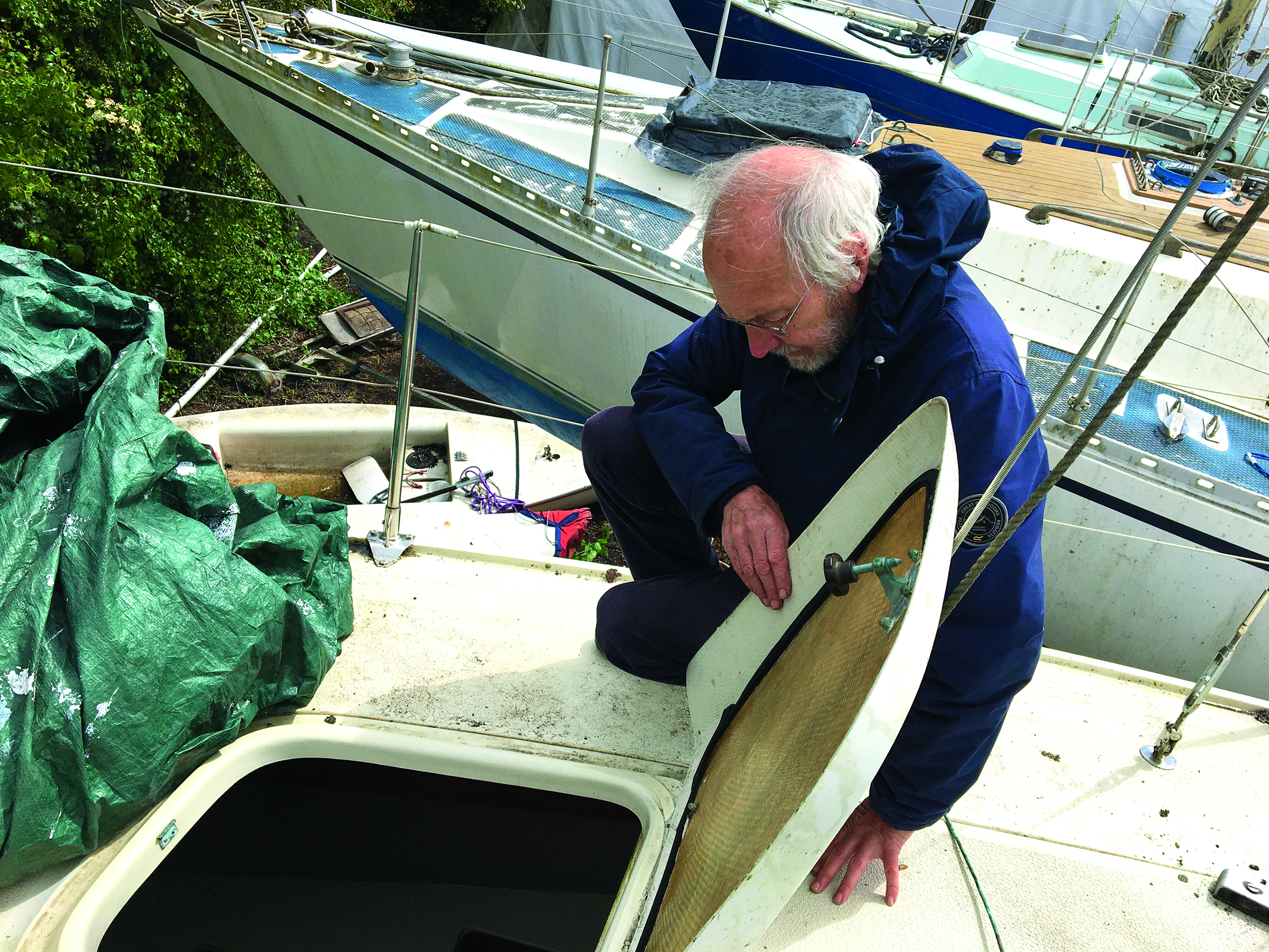 Graham lifts the forward hatch which not only leaks but will also need strengthening