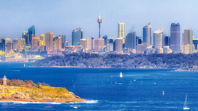 Hornby lighthouse on Sydney Harbour’s South Head with the city in the background. Credit: Taras Vyshnya/Alamy