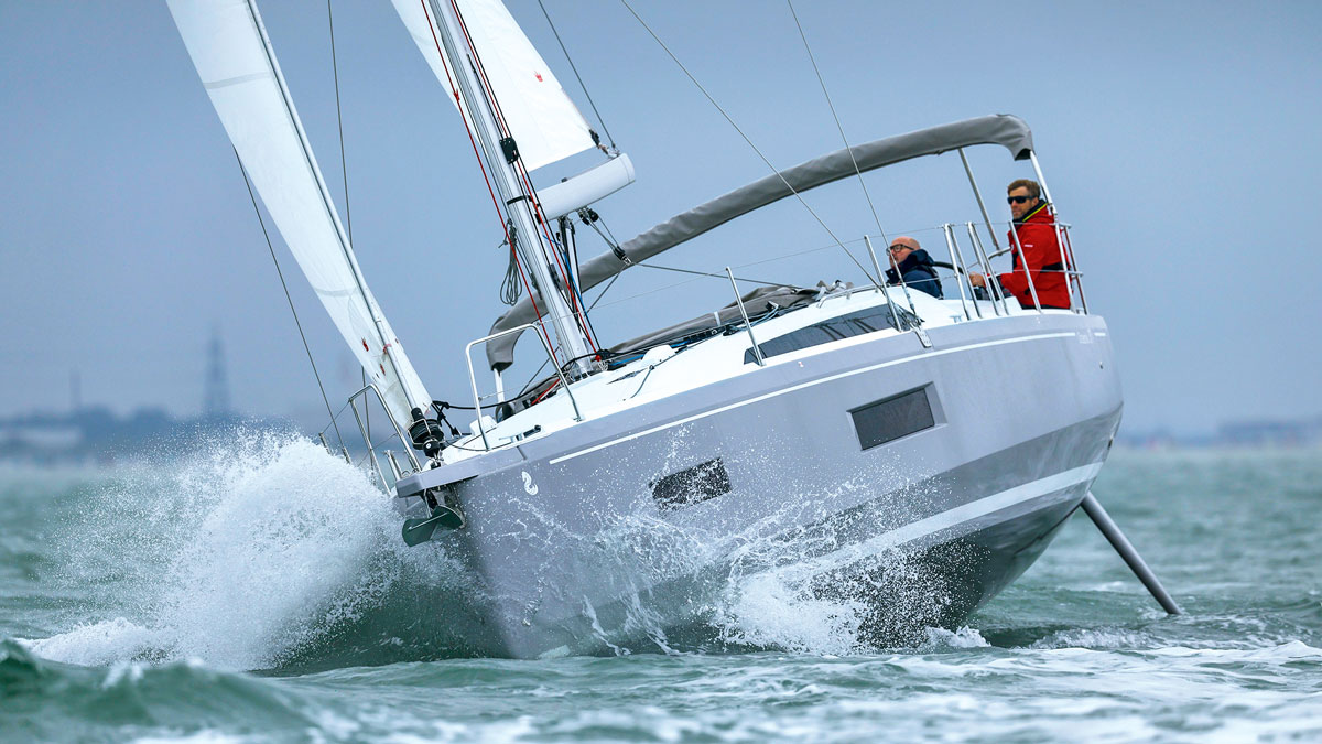 A boat sailing where you can easily see the boat rudders
