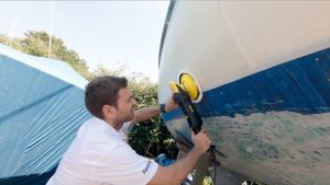 boat-polishing-tips-PBO270.polish_topsides.romain_uses_the_profile_finish_with_the_lambswool_pad