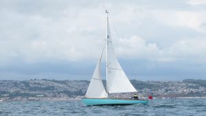 Katie McCabe sailing her 26ft restored Morgan Giles Falanda