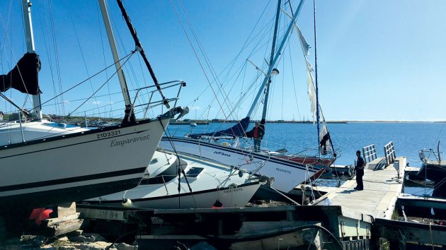 Boats on the shore after a hurricane has passed through