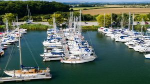 an aerial view of yachts berthed at Chichester Marina