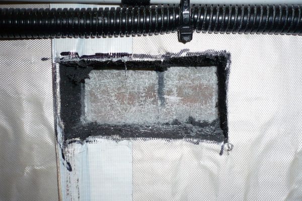 Diesel Dipper installation - scored the surface of the bulkhead in order to give a key for bonding the mounting pads on with epoxy