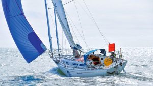 A yacht sailing towards the horizon