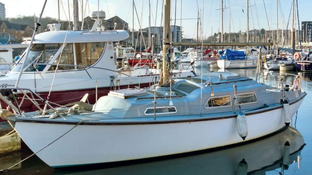 A Sabre 27 yacht moored in a marina