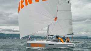 a Bente 28 being sailed under cloudy skies