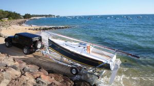 A boat on a trailer on a slipway