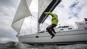 A man falling overboard from a boat