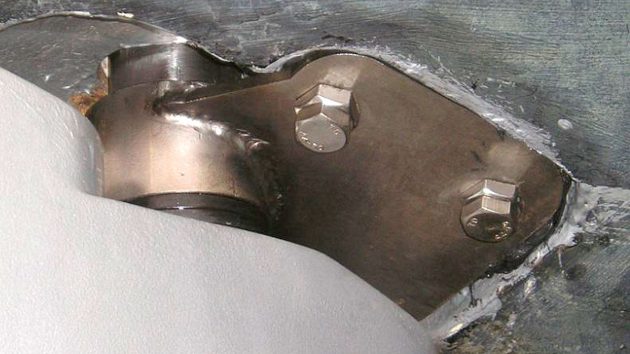 A bearing plate bolted into place on a yacht