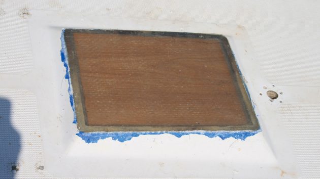 Masking removed from an oak board